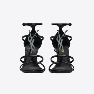 YSL YVES SAINT LAURENT 	
CASSANDRA SANDALS IN PATENT LEATHER WITH BLACK